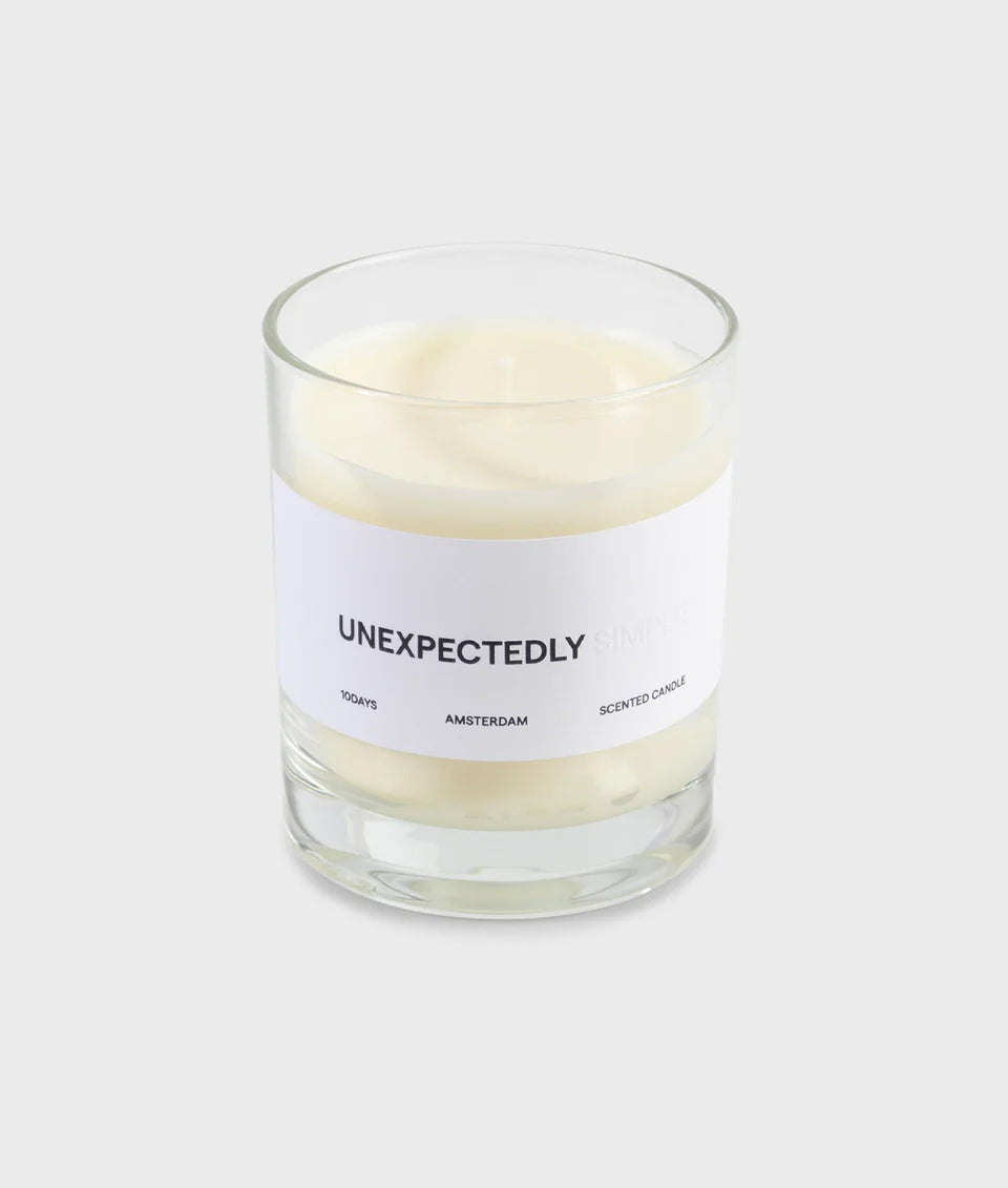 UNEXPECTEDLY SCENTED CANDLE